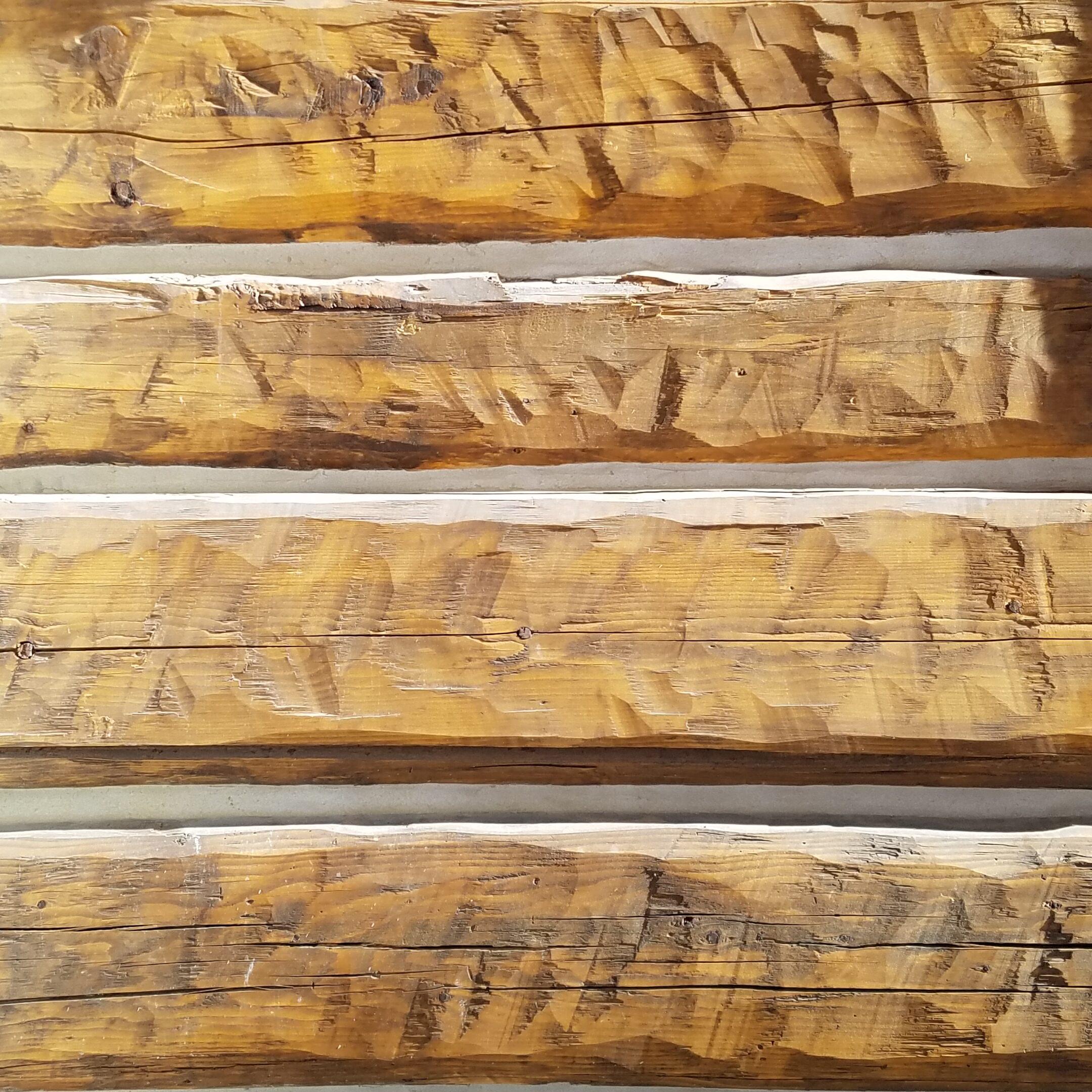 Prechinked, pre-shrunk log wall